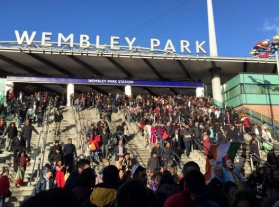 Narendra Modi UK visit 2015: Pics of electric atmosphere at Wembley Stadium for 'UKWelcomesModi' community reception People arriving in throngs at Wembley station to go to Wembley Stadium for the event